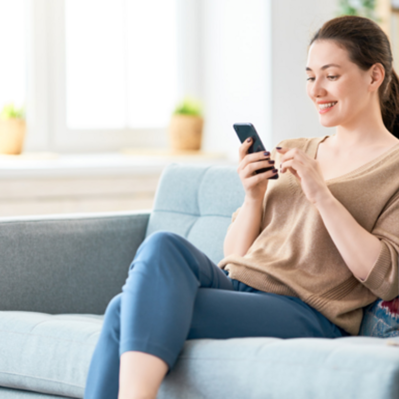 Ph Pic Casual Woman Talking Phone Sitting Sofa 1422270389 Ne